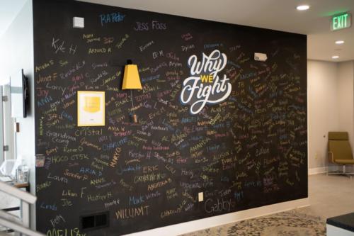 Add your name or a loved one’s name to our Why We Fight Wall. Ring the bell when you hit a treatment milestone. We love to gather for a celebration.