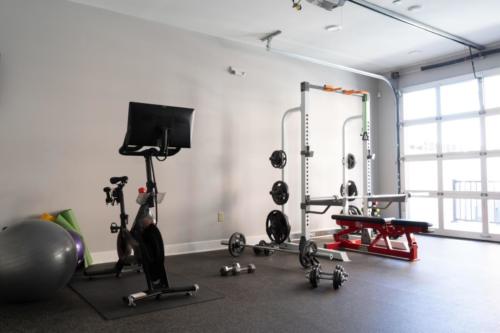 Need to do some yoga, cardio or strength training? Check out our fitness room which has the ability to open to the backyard for lots of fresh air. 