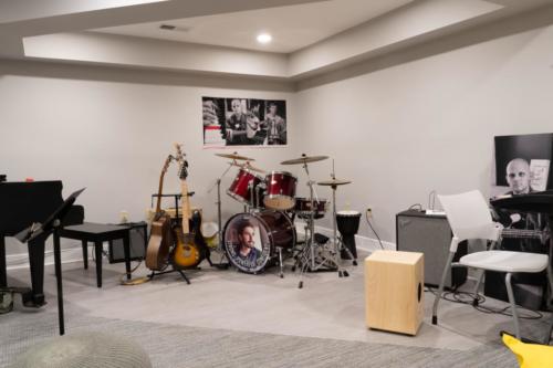 Interested in playing a musical instrument? We have a piano, keyboard, lots of guitars, and drum set for you to rock out on.